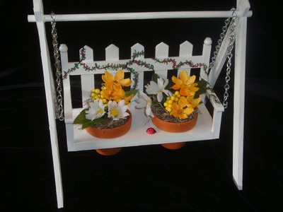 Make a decorative wood swing: it's a flower pot holder. A great gift project!