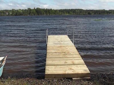 How to build a floating dock using barrels.   detailed step by step instructions
