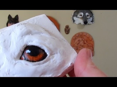 Painting Dog Eyes on Paper Mache Sculpture