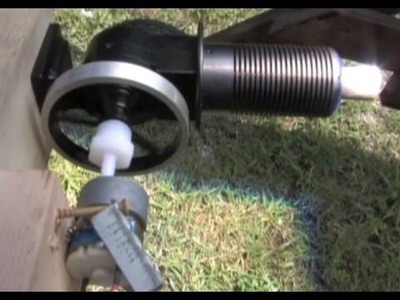 Stirling Hot Air Engine Producing Electrical Current from a Small DC Hack Generator
