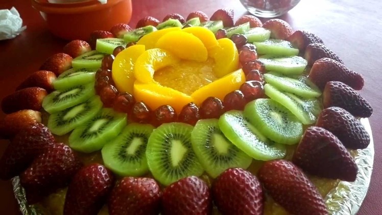 Decorating a cake with Fruit