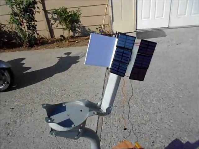 Home-made Solar Tracking System with no electronics for solar panel or solar oven