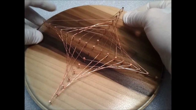 Copper wire astroid plaque
