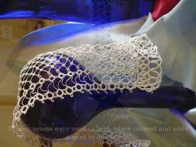 Tatting on a blessing dress for a baby