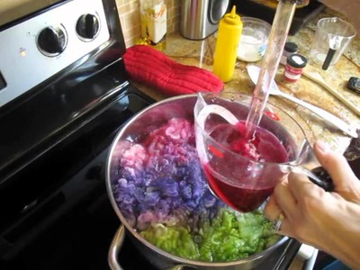 Dyeing wool on top of the stove with a dye stock solution