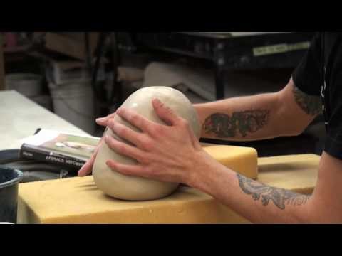Joey Chiarello demonstrates sculpting an animal from a hollow tube