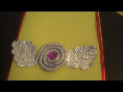 Recycling : Silver foil paper rolling flower