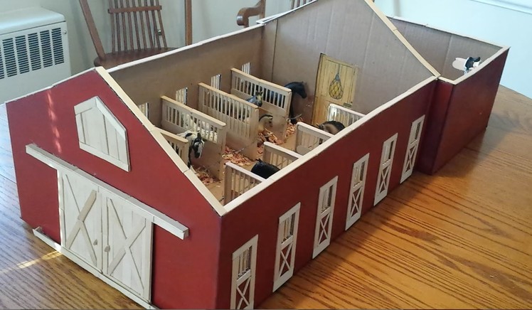 A Tour Of My Homemade Schleich Barn from Craft Sticks and a Box