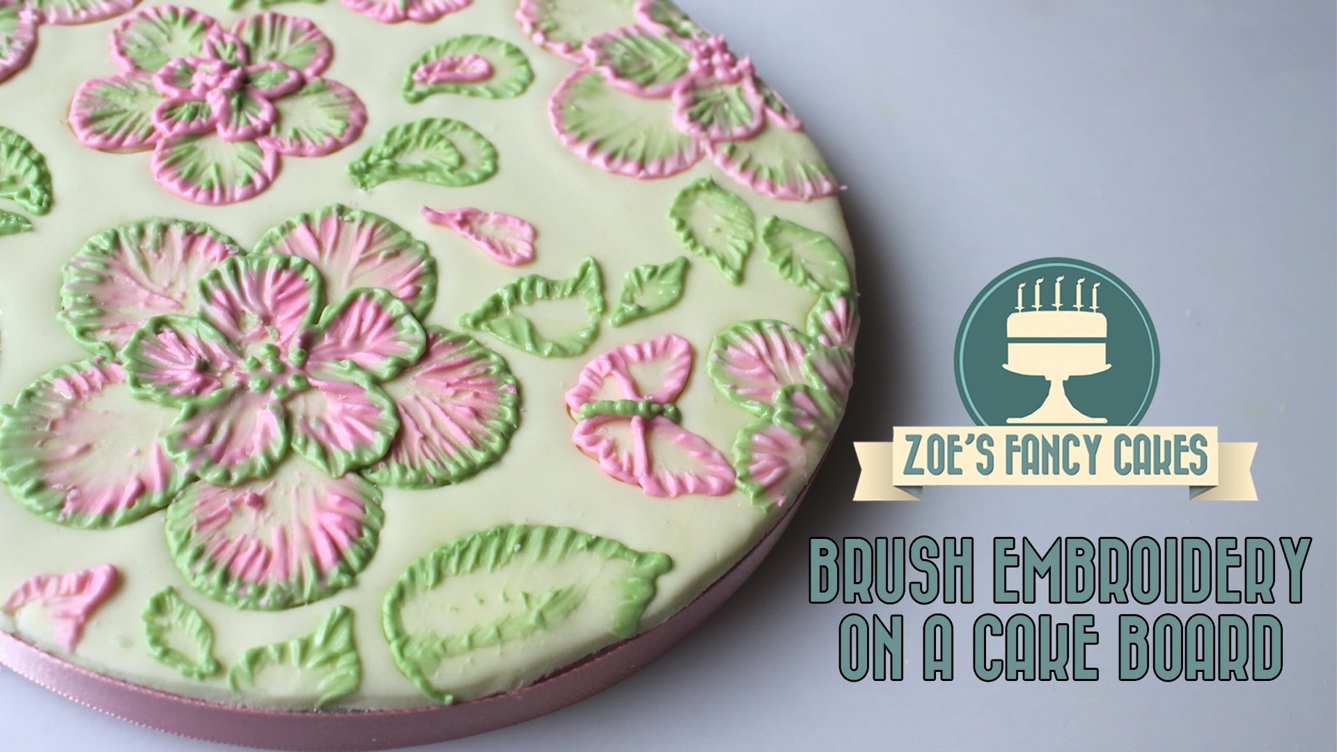 Royal icing brush embroidery on a cake board tutorial how to cake decorating tutorials