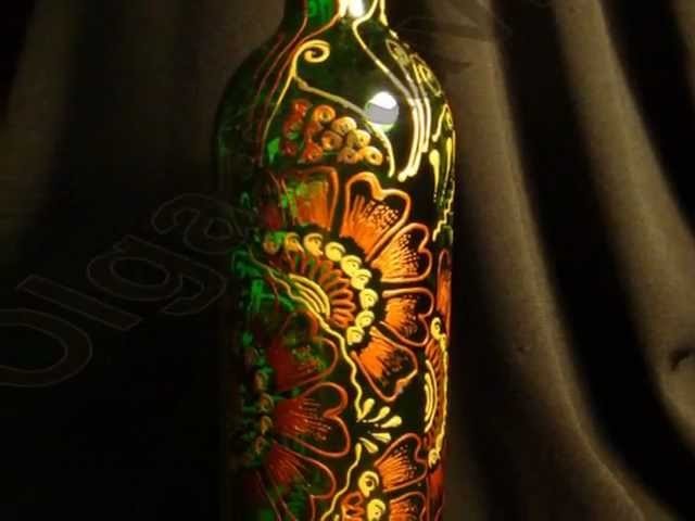 Hand painted wine bottles by Olga Stavrou