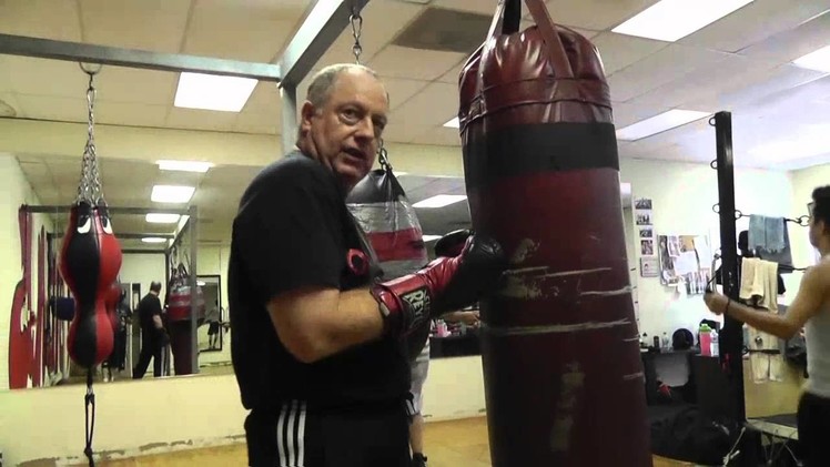Working the uppercut on a heavy bag