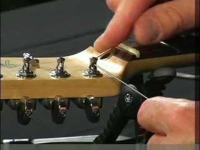 How To Restring Guitars With A String-Through Body