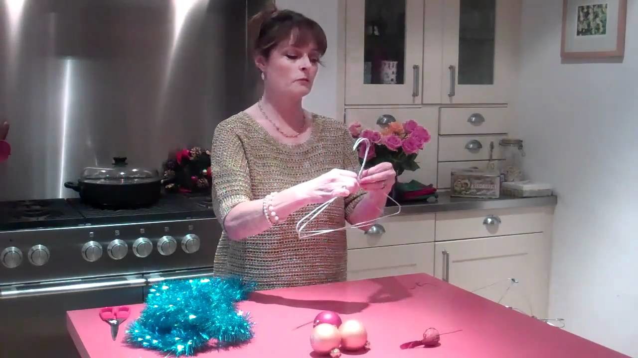 Janet Ellis makes Christmas advent crown decoration filmed on a Flip Video