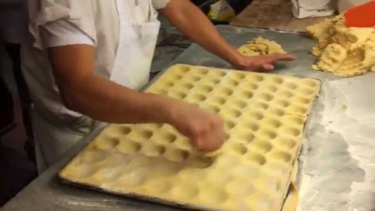 Veniero's baker making handmade tart shells.