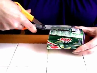 How to make a soda can candle holder.wmv