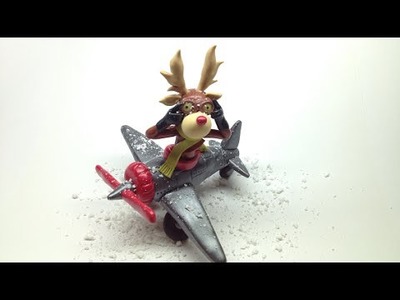 Reindeer in the airplane. Rena no avião- Polymer clay (Fimo soft)