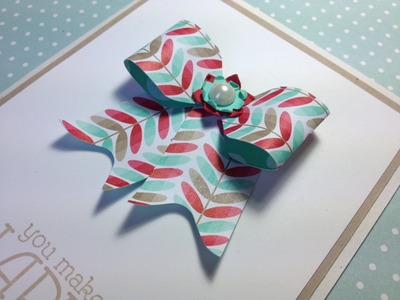 Make a paper bow on the Envelope Punch Board featuring Stampin' Up! products