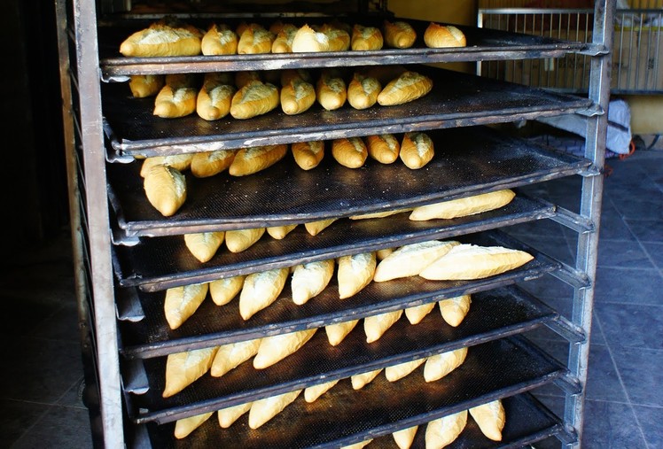 Local Banh mi production: How original Vietnamese baguettes.breads are made