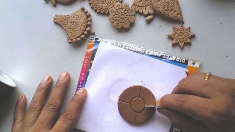 Terracotta.clay jewellery making tutorial: how to make a simple flower pendant