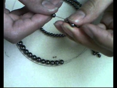 How to Make a Basic Necklace on Tigertail Wire.wmv