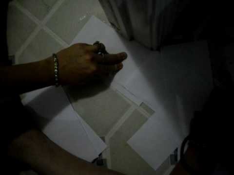 Cutting tile pattern using paper template