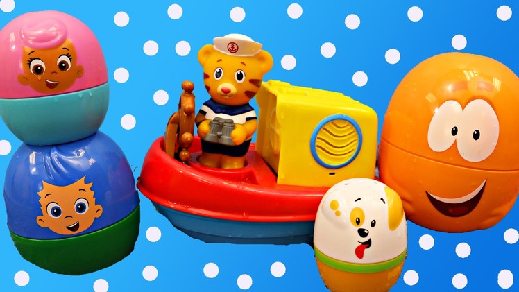 Bubble Guppies Surprise Eggs & Daniel Tiger's Neighborhood Bath Toy Boat DisneyCarToys