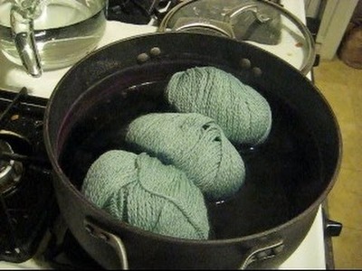 Dyeing Experiment:  Partially Submerging Balls of Yarn in a Dyebath