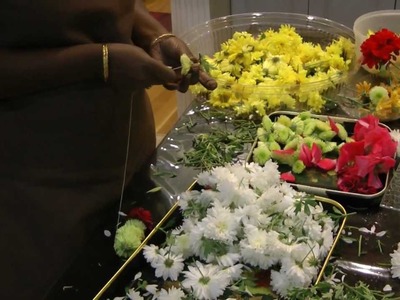 Making Garlands to SaiBaba with Fresh Flowers