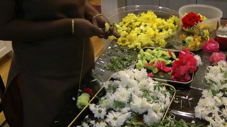 Making Garlands to SaiBaba with Fresh Flowers