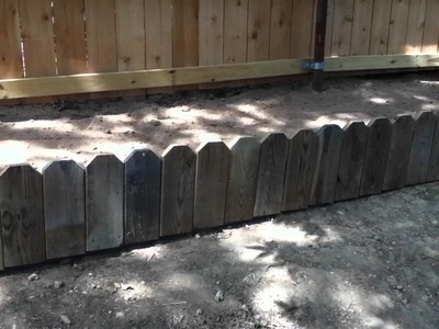 Great flower bed idea for old picket fence