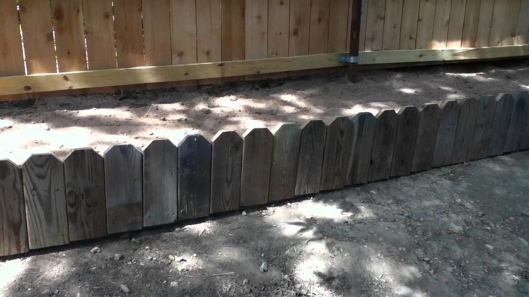 Great flower bed idea for old picket fence