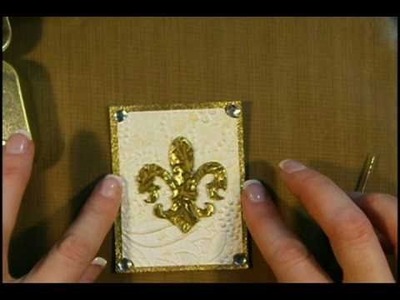 How to make a Fleur De Lis Themed ATC using Chipboard and Embossing Powder