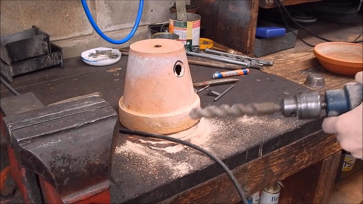 Melt aluminium in a flower pot furnace