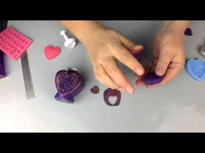 Covering a glass bottle with polymer clay to create a Bottle of Hope