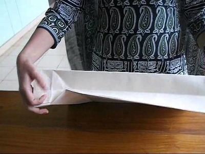 How to make a simple Paper carry-bag (explained in Malayalam)
