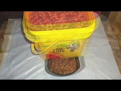 DIY Pet Feeder Using An Empty Litter Bucket