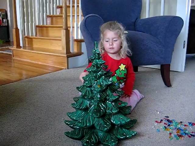 Decorating the little Christmas tree