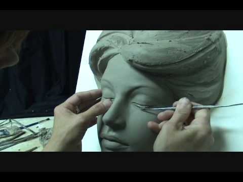 Sculpting a face in clay. Sculpting demo how to sculpt girl's face.
