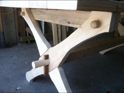 Build a table that is held together with 2 wedges and 4 dowels. Knock down furniture.Trade secret.