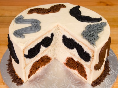Surprise Inside Mustache Cake from Cookies Cupcakes and Cardio