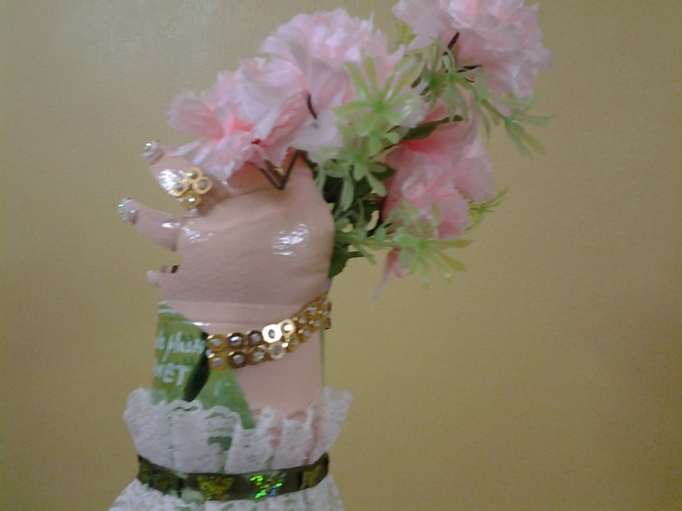 Best Out of waste Plastic bottle transformed to vase with hands carrying flowers