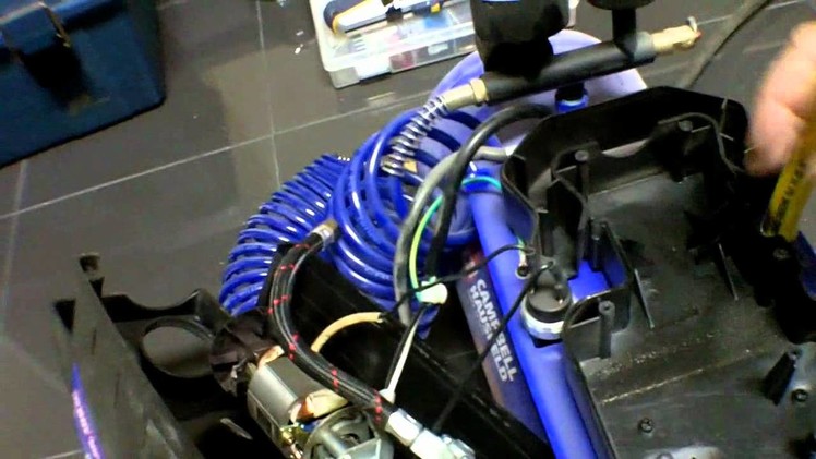 Silent air compressor using a refrigerator compressor.