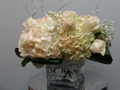 How to Make a Centerpiece with Hydrangeas and Roses in a Cube Vase