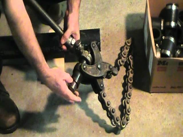 Old plumber shows how to cut cast iron pipe.