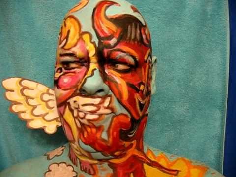 Devil or Angel? Face paint art in motion Video. Artist James Kuhn.