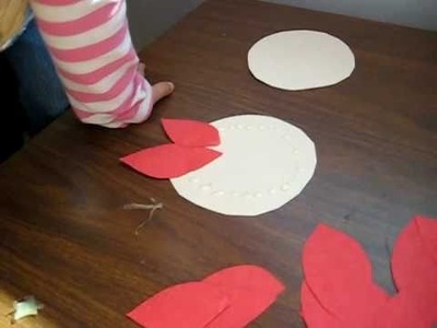 Christmas. Arts and Crafts activity: Red color paper poinsettia flower idea for kids.