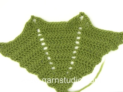 DROPS Crocheting Tutorial: How to work a right wing to a bat table coaster.