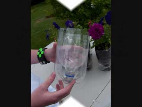 Soda bottle self watering plant container.wmv