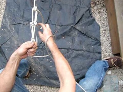 Hand tying a net.MOV