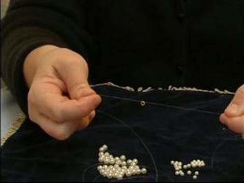 How to Make Beaded Necklaces : How to Tie a Jump Ring for Pearl Necklaces